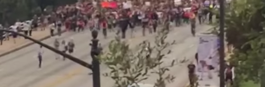 Bridge-Blocking Student Demonstrators at University of Texas-Austin Obstruct Traffic to Protest Trump